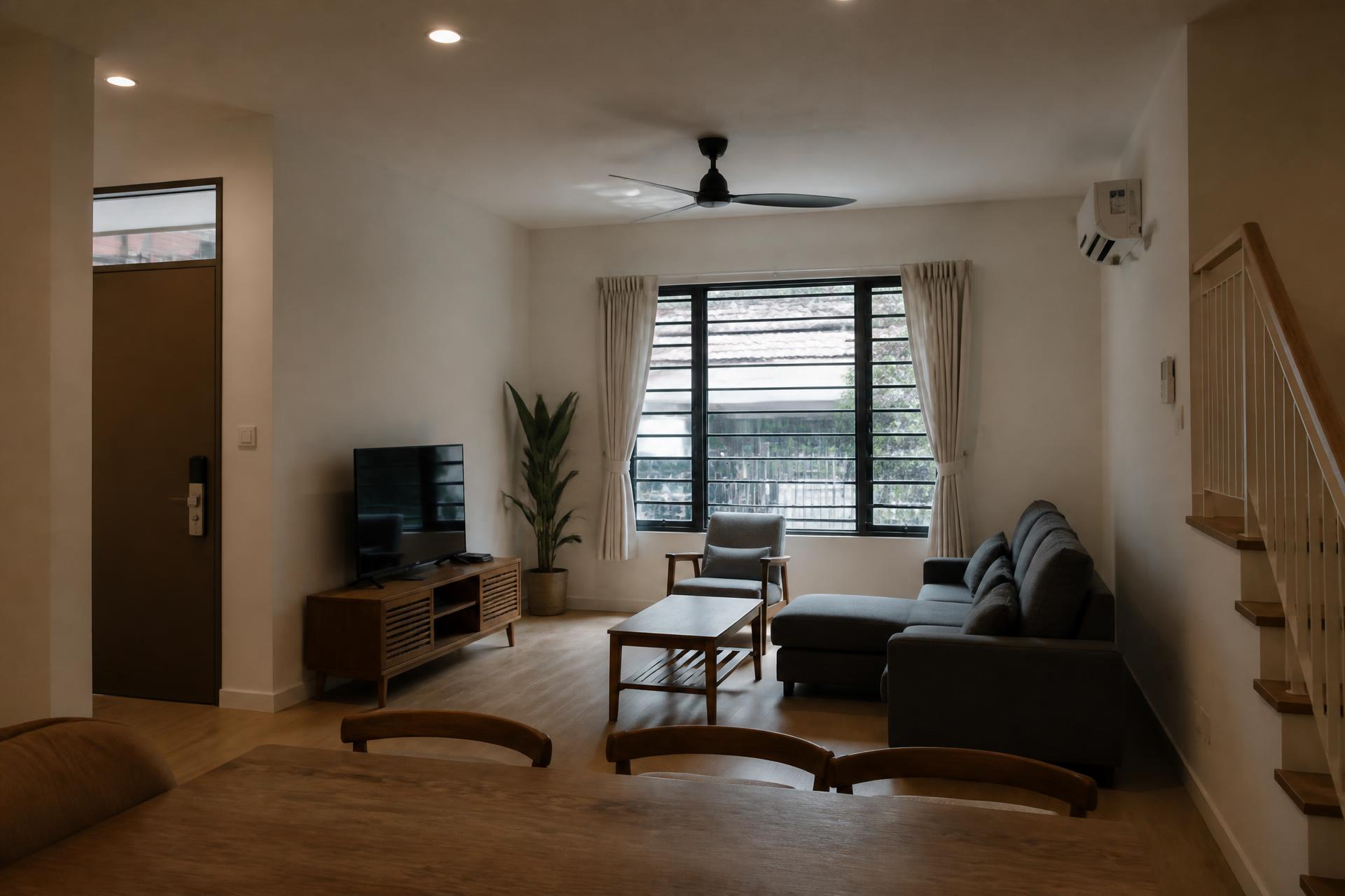 Renovated living room of a Malaysian terrace house completed by Bina Haus